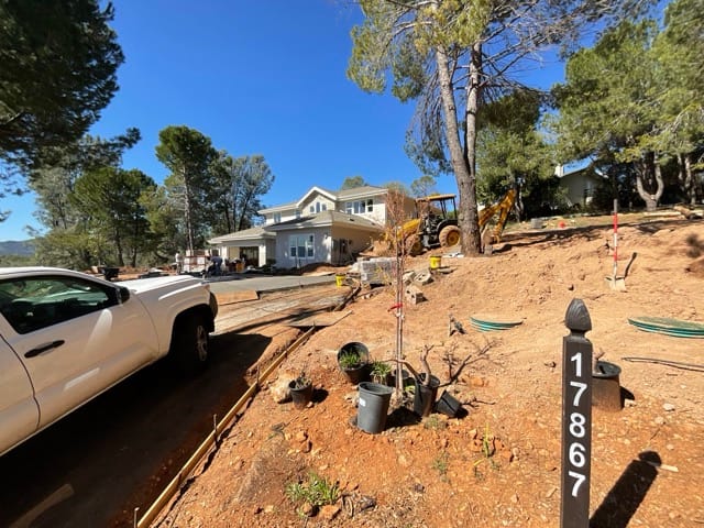 Wide street view of the 18767 Deer Hill Rd lot in HVL.