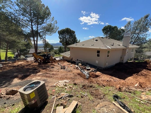 From the front or back yard and inside the home you can see great lake view and a close up of the roofing and gables at 18767 Deer Hill Rd. Hidden Valley Lake CA