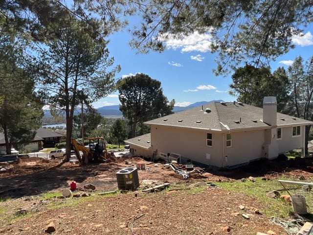 New USA Houses home coming soon March or April 2026. From the front or back yard and inside the home you can see great lake view and a close up of the roofing and gables at 17867 Deer Hill Rd. Hidden Valley Lake CA