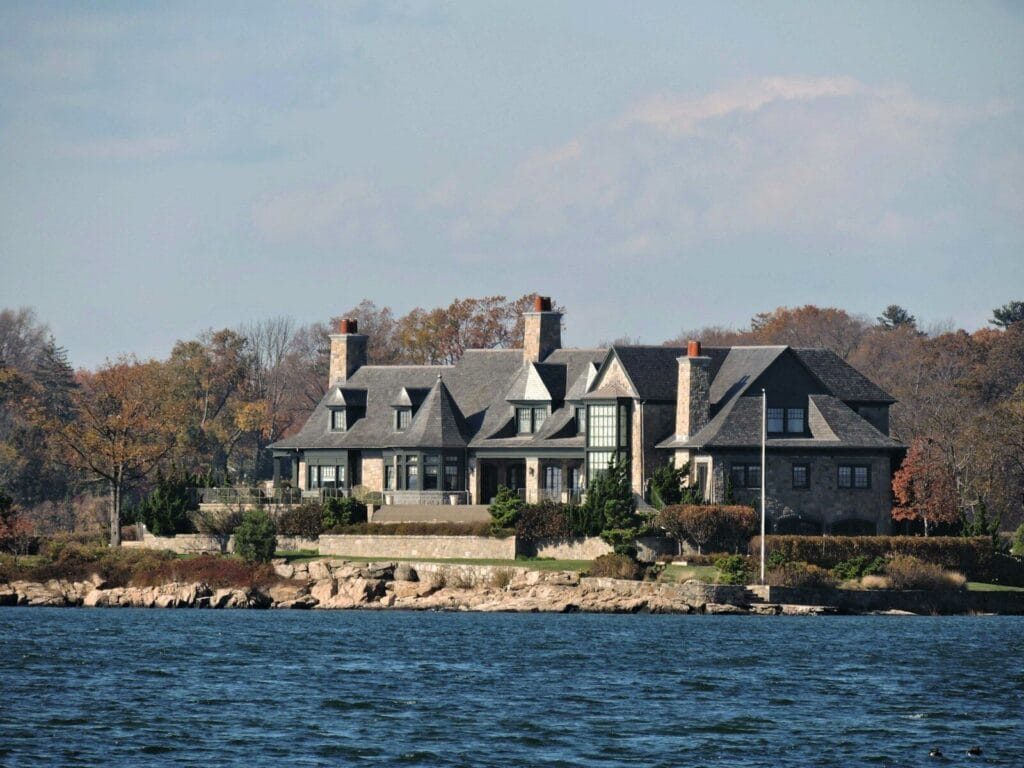 Large stone house on the water's edge, Wyoming real estate, Washington houses, Naples real estate in Florida etc
