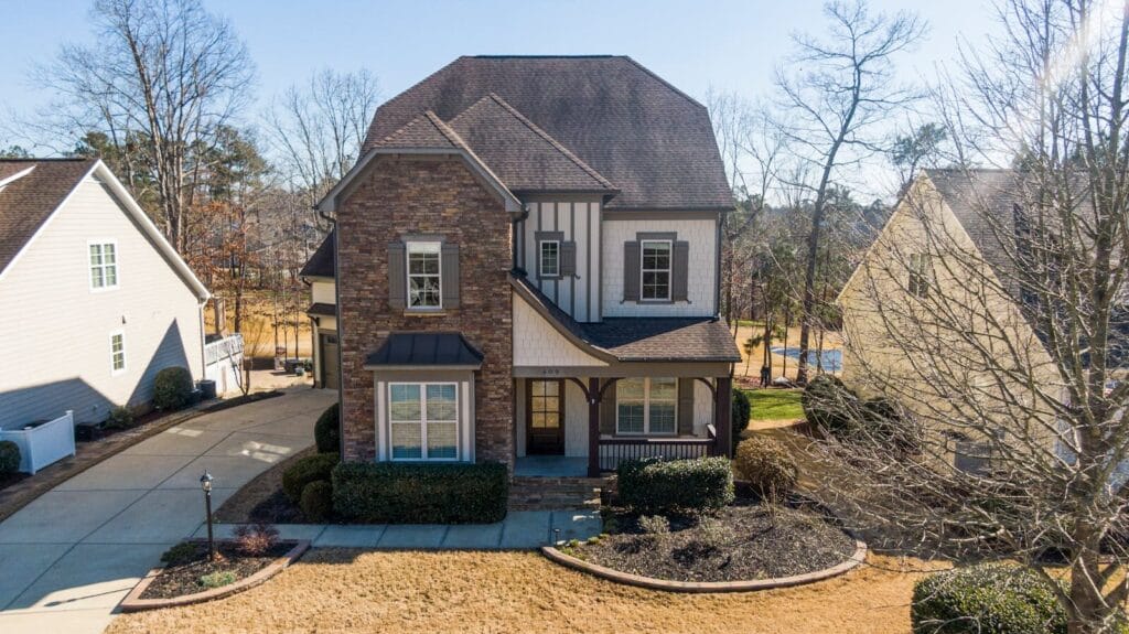A beautiful two-story house with stone facade and lush yard not Birmingham real estate in Alabama but in Holly Springs, NC.
