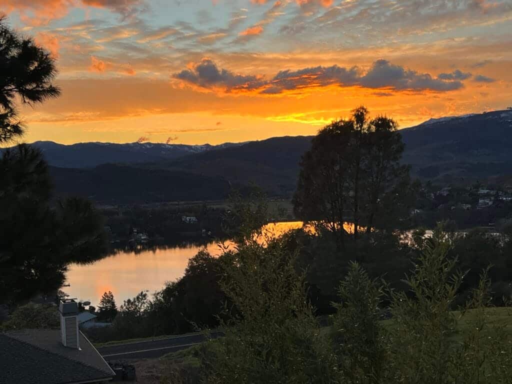 Beautiful Sunset With California Lake and Mountain Views