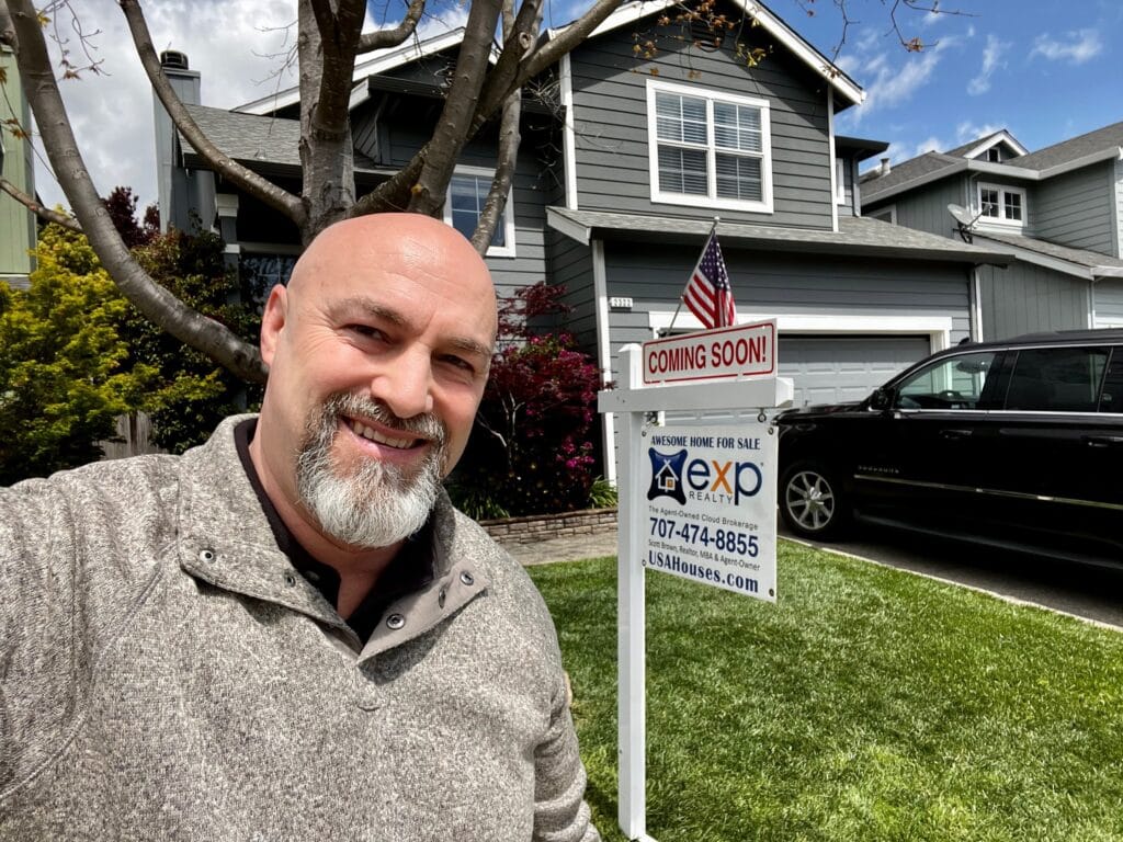 Real estate broker Scott Brown standing in front of a Northern California home for sale with a coming soon sign. Tell me "sell my home". Sold, Santa Rosa CA, Sonoma County California, Wine Country.