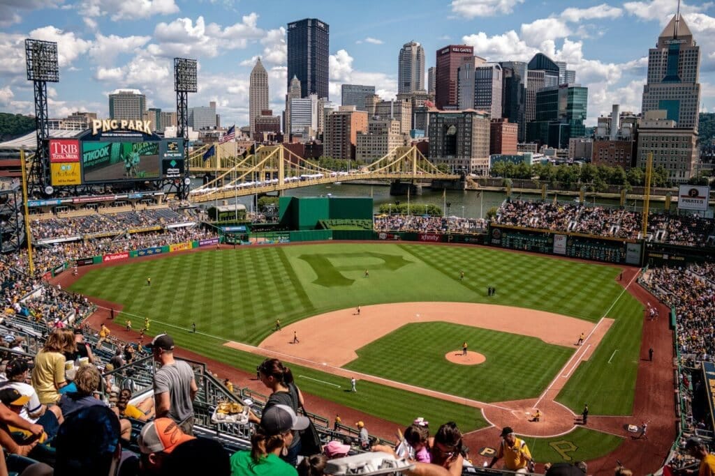 Pittsburgh Pirates baseball game surrounded by city skyline, pittsburgh real estate