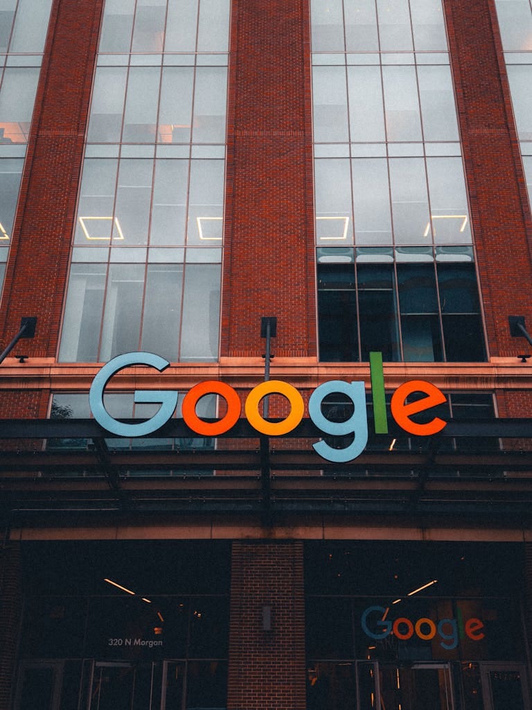 Commercial Real Estate Office Building Colorful Google logo on modern building exterior in urban environment.