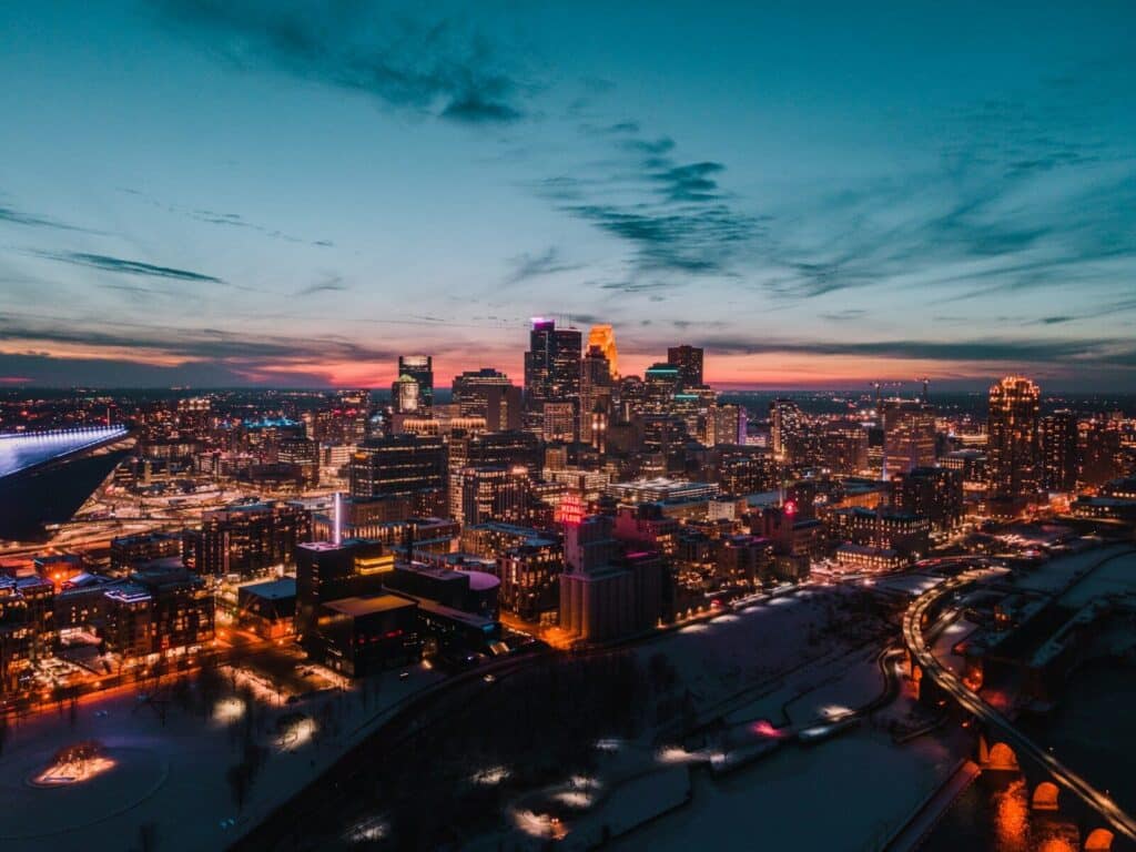 Minneapolis city with high rise buildings during night time
