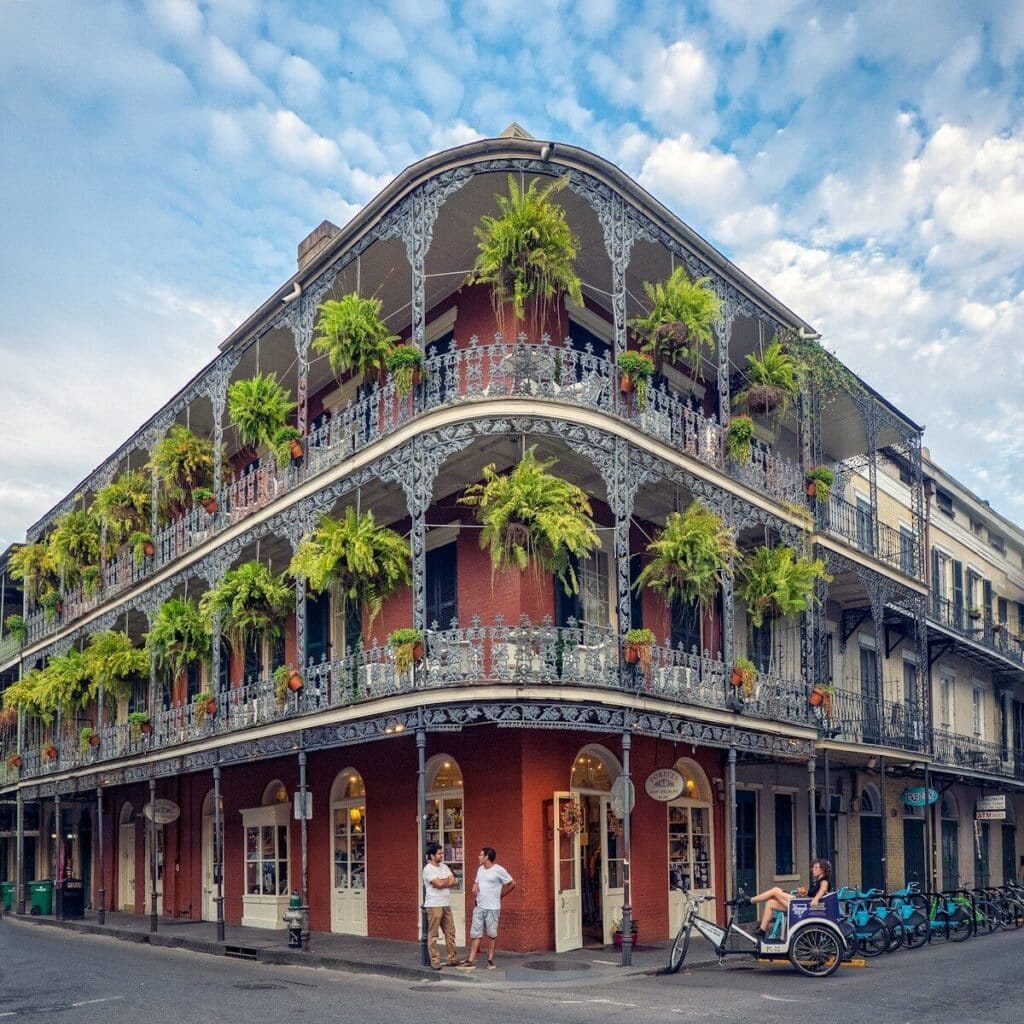 New Orleans real estate features Neighborhoods like this one with the iconic brown and gray 3-story building