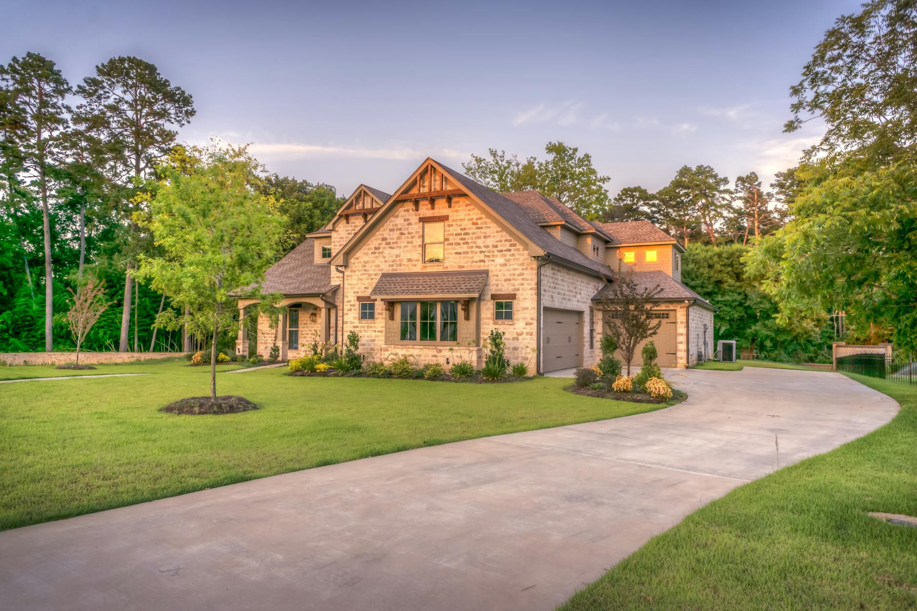 new construction incentives on new homes like this beige bungalow house are happening across America