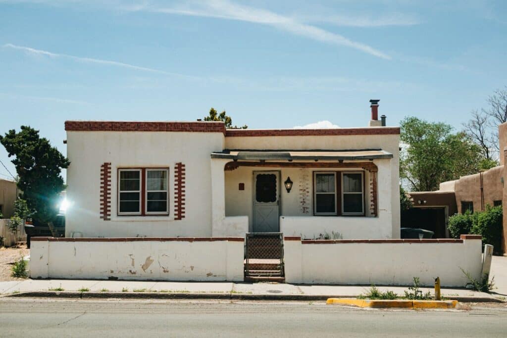 El Paso real estate, white and brown concrete house under blue sky during daytime