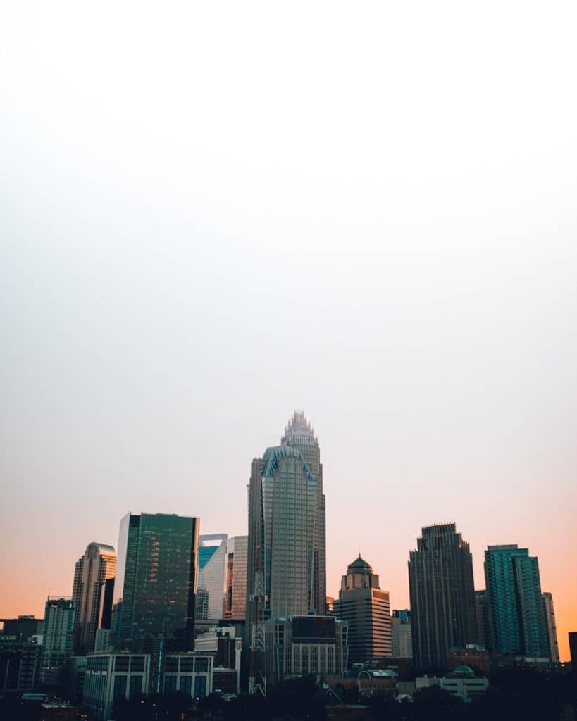 a view of the Raleigh NC city skyline at sunset